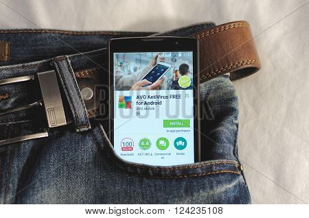 SARANSK, RUSSIA - April 3, 2016: Photo of Smartphone in a jeans pocket with AVG antivirus application in a Google Play Store on the screen.