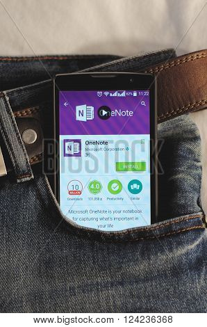 SARANSK, RUSSIA - April 3, 2016: Photo of Smartphone in a jeans pocket with Microsoft OneNote application in a Google Play Store on the screen.