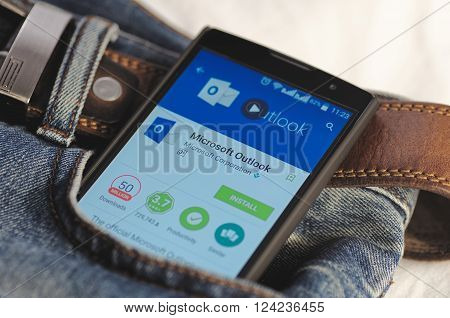 SARANSK, RUSSIA - April 3, 2016: Photo of Smartphone in a jeans pocket with Microsoft Word application in a Google Play Store on the screen.