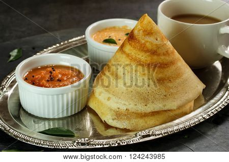 Cone shape Masala Dosa with Sambar and chutney south Indian breakfast