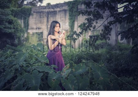 Portrait Of Asia Women With Mask On Nature