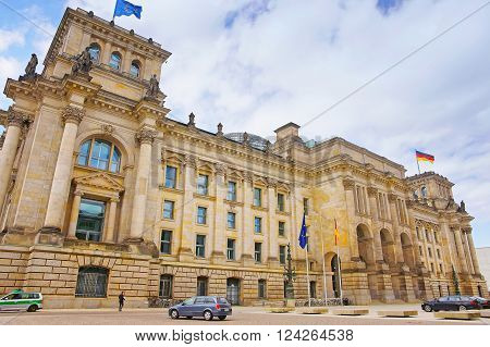 Reichstag building in Berlin of Germany. Reichstag is a well-known building which is placed on the Konigsplatz. Bundestag (Parliament of Germany) works in the Reichstag building.