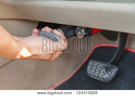 Pull for lock brake pedal of the car