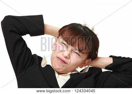 portrait of demented businesswoman on white background