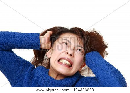 portrait of Asian woman demented on white background