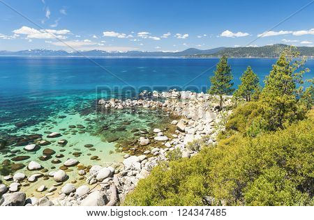 Beautiful boulders and crystal clear water of the lake Tahoe. Hidden Beach, Lake Tahoe - Nevada, USA