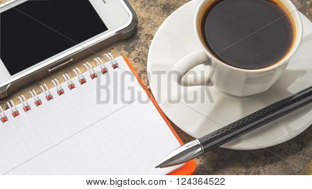 Coffee break set on the stone table