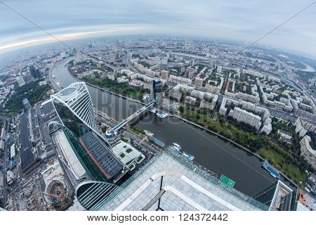 MOSCOW, RUSSIA - SEP 3, 2014: Futuristic Moscow International Business Center, river, Bagration bridge. Years of construction of complex - 1995-2018