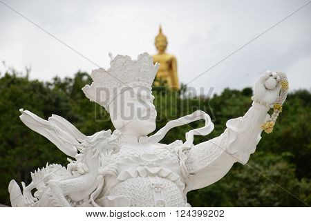 Standing white statue of the Chinese gods