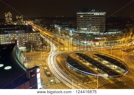 WROCLAW POLAND - MARCH 10 2016: Traffic roundabout shot with long exposure time at night Grunwaldzki Square March 10 2016 in Wroclaw Poland.