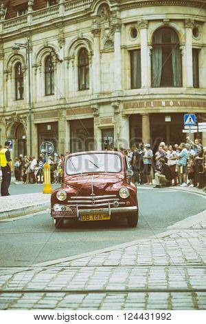 Wroclaw- August 18: Old red car on Motoclassic show on vintage effect in Wroclaw Poland on August 18 2014.