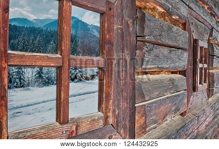 Reflection in window - cottage in Zuberec Slovakia