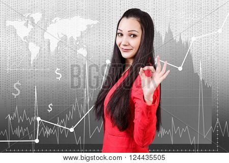 Young woman standing on the traiding graph background. Elements of this image furnished by NASA
