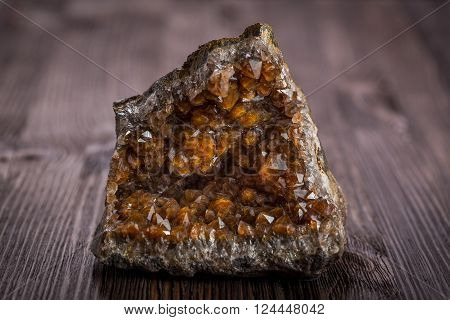 Druse of quartz on a dark wooden background - Mangyshlak Kazakhstan