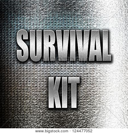 Grunge metal Survival kit sign with some soft flowing lines