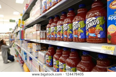 New Westminster, BC, Canada - April 03, 2016 : Beverages corridor in Walmart store inside Walmart store