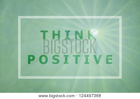 Think positive word inspirational quote on green leaf background