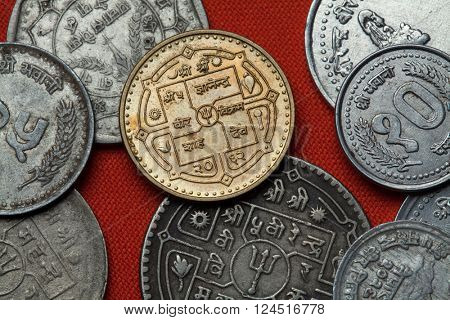 Coins of Nepal. Hindu trishul depicted in the Nepalese rupee coin.