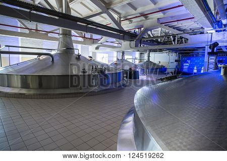 Saint-Petersburg, Russia - March 1, 2016: Brewhouse for beer and soft drinks plant. Vats and beverage containers.