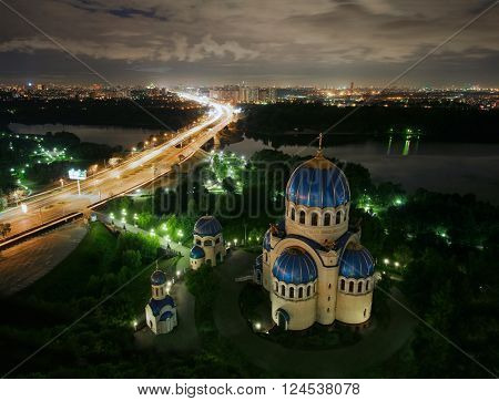 Temple of Holy Trinity, highway and panorama of Mosocw at night, Russia