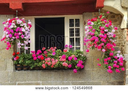 Saint-Brieuc (Cotes-d'Armor Brittany France): old typical half-timbered house with flowers
