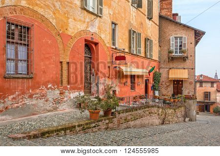 Colorful houses of old town of Saluzzo in Piedmont, Northern Italy.