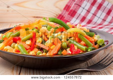 Mexican Mix of Vegetables. Tomatoes, Beans, Celery Root, Green Beans, Peas, Corn. Dietary Food.