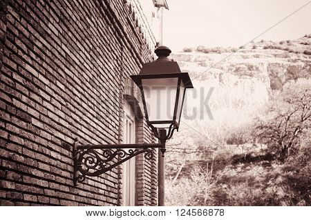 Traditional forged iron lamp on the street of Kalaubani area in Old Tbilisi