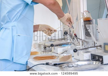 The process of monitoring the quality of the blood. Instrumental laboratory manipulations