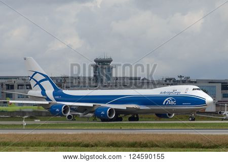 DOMODEDOVO RUSSIA - JULY 20: Aircraft operated by AirBridgeCargo taxiing at Moscow airport in Domodedovo on July 20 2013. The company in its fleet has 4 aircraft Boeing-737-8F