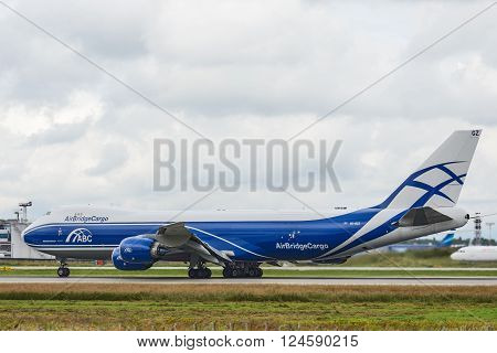DOMODEDOVO RUSSIA - JULY 20: Aircraft operated by AirBridgeCargo taxiing at Moscow airport in Domodedovo on July 20 2013. The company in its fleet has 4 aircraft Boeing-737-8F