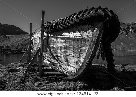 Mono abandoned rowing boat on wooden blocks