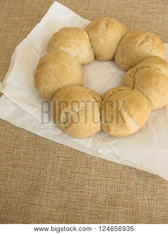 Homemade roll wreath on white greaseproof paper