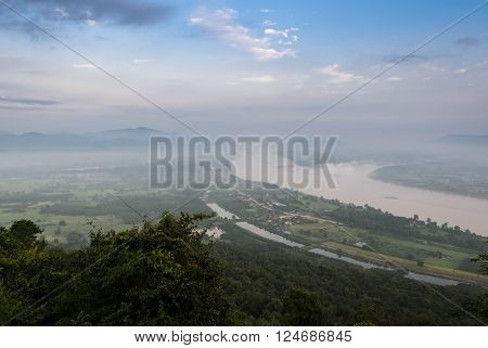 Aerial landscape view of Mekong river with mountain ranges with morning mist in Nong Khai Province Thailand