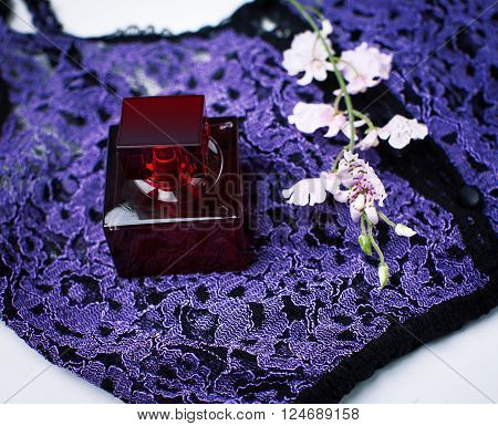 stylish bottle of Women's perfume and clothes