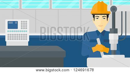 Man working with industrial equipment.