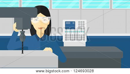 Woman working with boring mill.