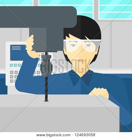 Man working with boring mill.