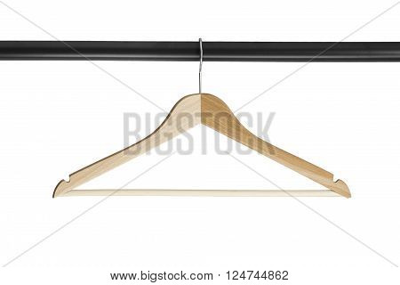 Wooden clothes rack on metal crossbar isolated over white