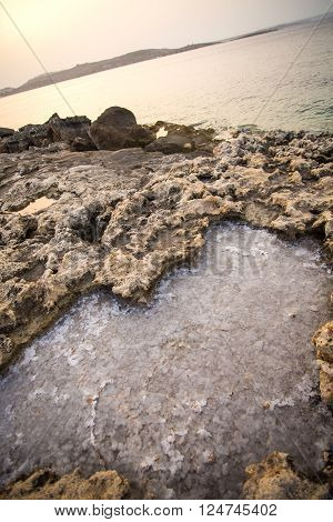 Salty water trapped in Rocks in Bugibba Malta Europe.