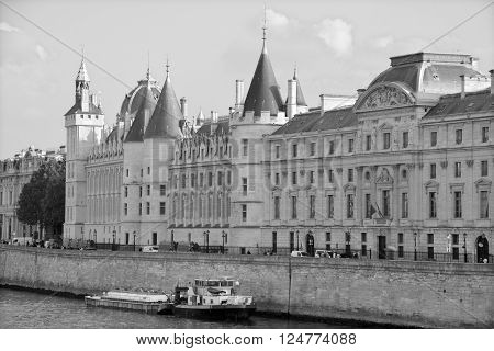 PARIS FRANCE MAY 22 2012: Castle Conciergerie is a former prison, located on west of the Cite Island (Ile de la Cite) and today it is a part of Palais de Justice, Paris, France