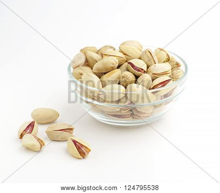 inshell pistachio nuts in cup, local focus, shallow DOF
