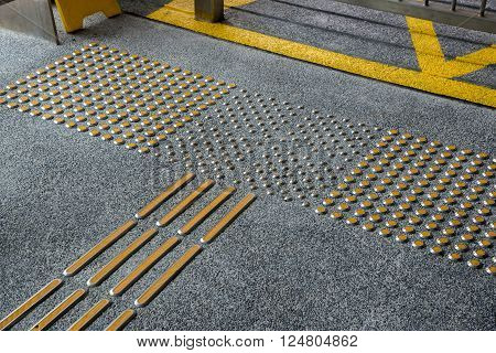 metal tactile paving for blind people in big city