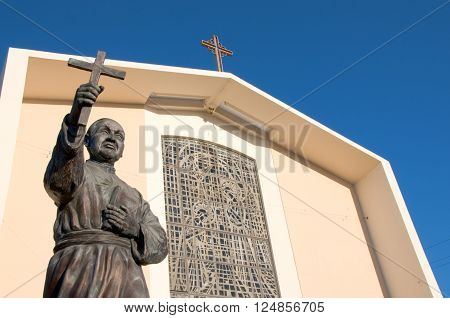 San Gabriel California USA./April 3 2016: Photo of Mission San Gabriel Arcangel with statue of Junipero Serra