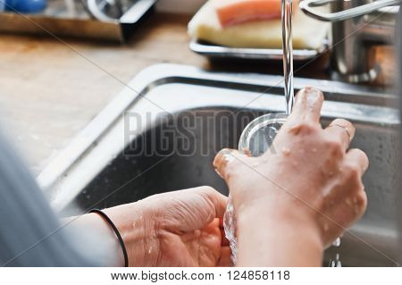 House Work,Close up image of washing dishes.