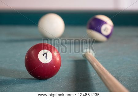 Billard balls on a green billard table