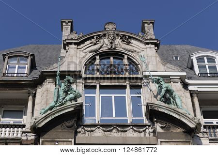 Belgium,Antwerp, March 17, 2016,Statues designed by Jef Lambeaux on the Hansahuis on the Suikerrui 