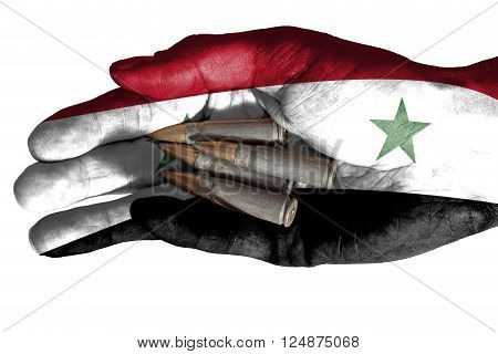 Flag of Iraq overlaid the hand of an adult man holding four bullets. Conceptual image for war violence conflicts. Image isolated on white background