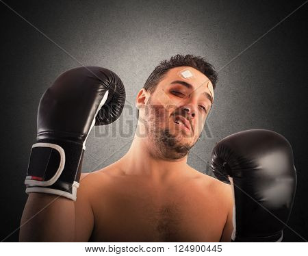 Boxer with bruises and bandages on face