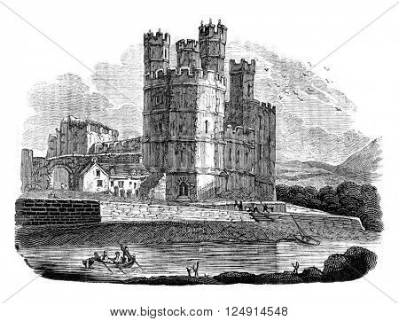 Caernarfon Castle, vintage engraved illustration. Colorful History of England, 1837.